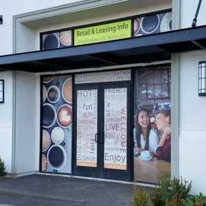 full printed vinyl graphics installed on all windows of a storefront