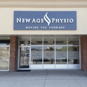 fascia sign for a physio clinic above the storefront entrance