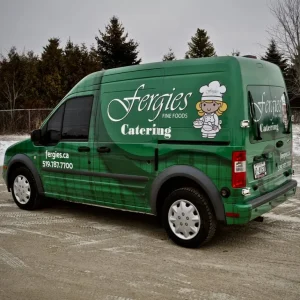 a mall work van with custom printed wrap for a catering company